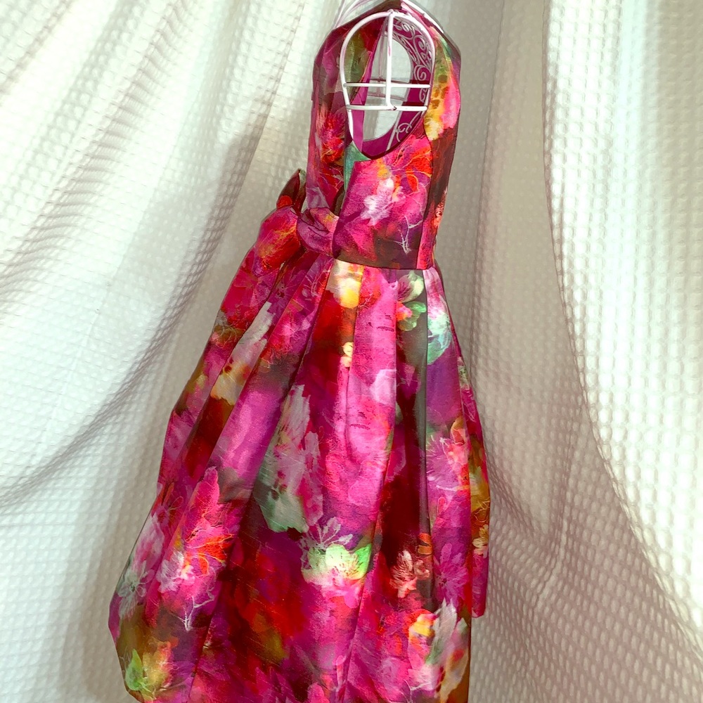 This a beautiful floral girls party dress.